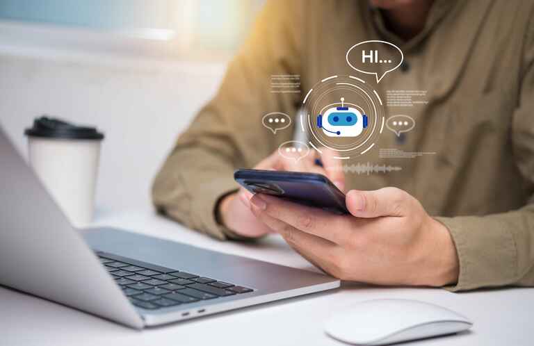 A photo of a person using an AI chatbot on their mobile phone