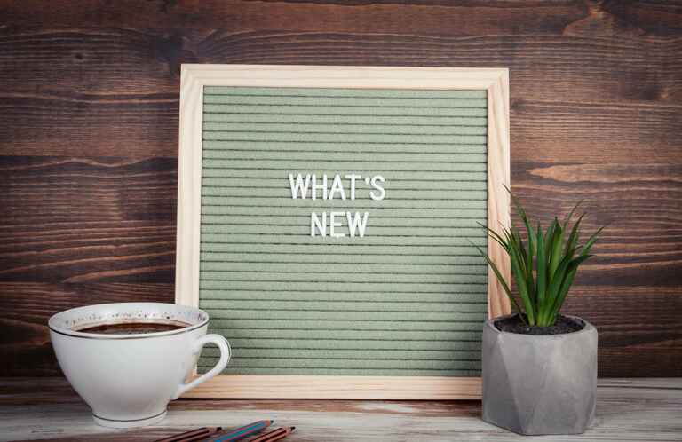 Bulletin board with the words What's new written down