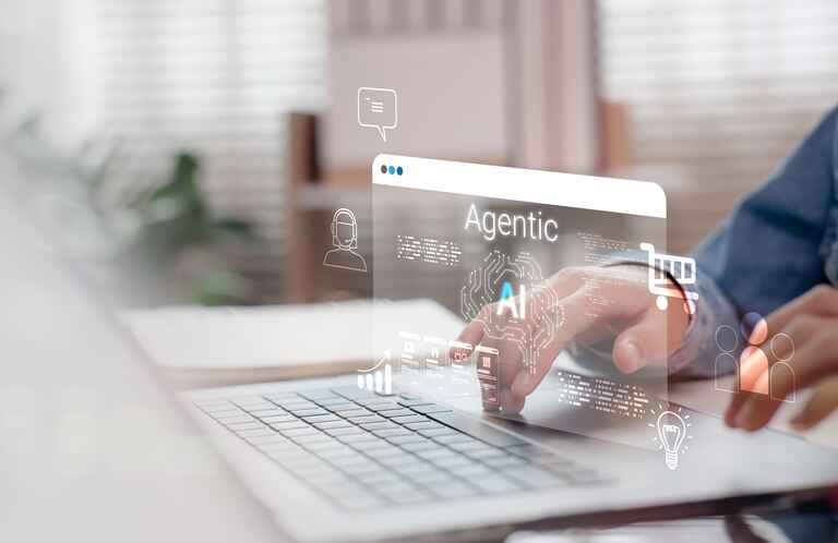 Person interacting with Agentic AI interface on laptop