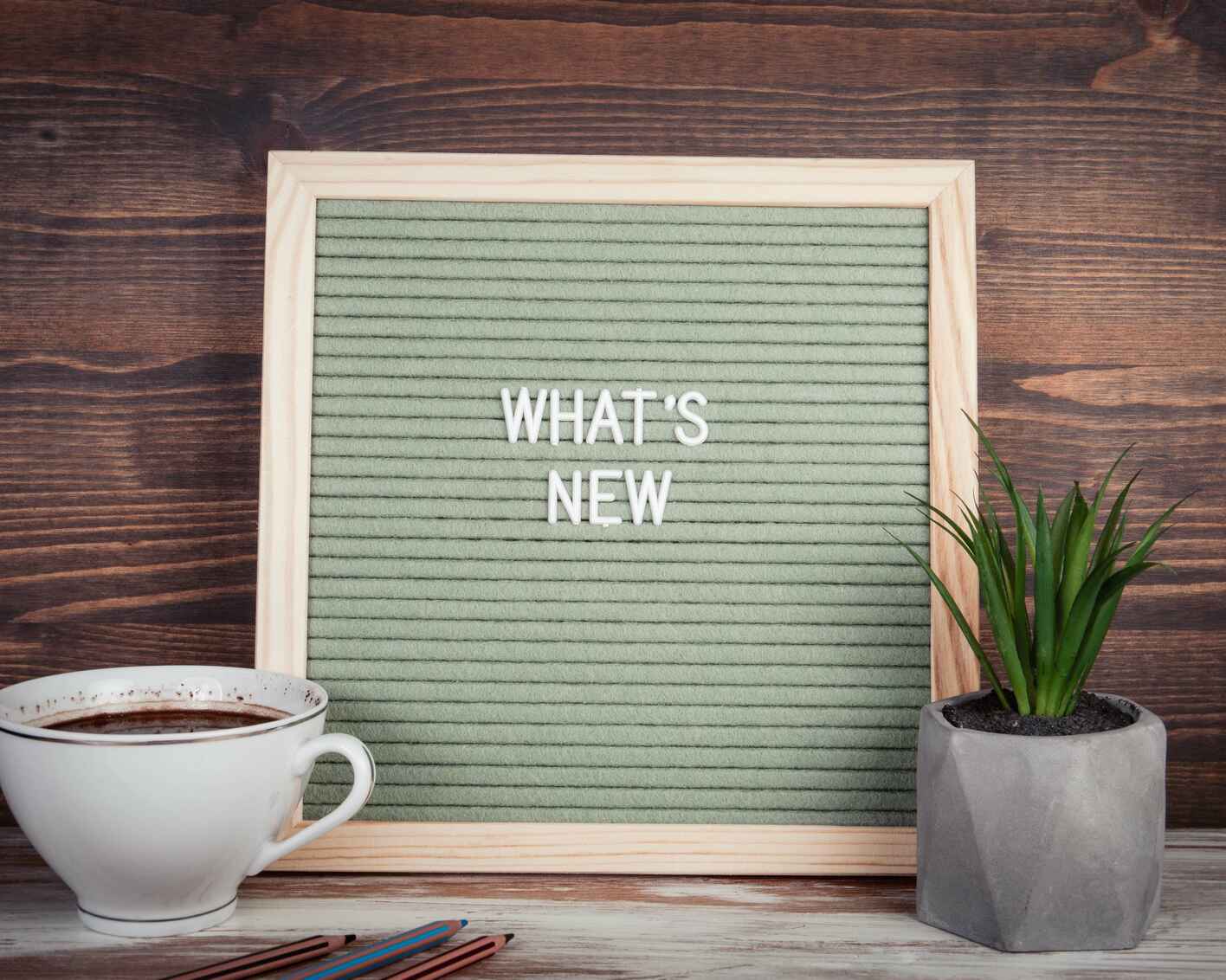 Bulletin board with the words What's new written down