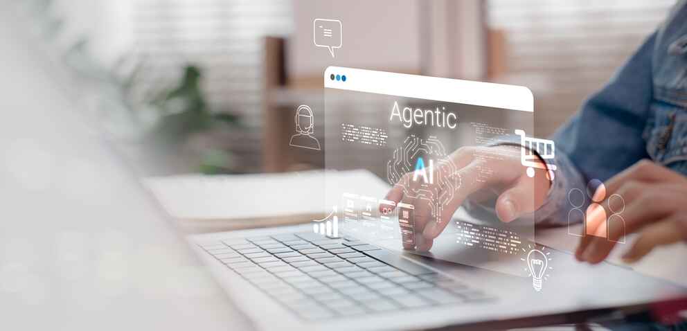 Person interacting with Agentic AI interface on laptop